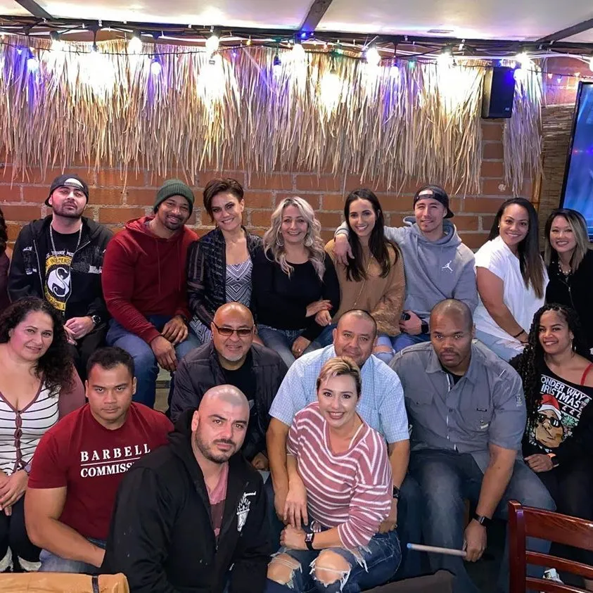 Corporate holiday party venue group photo near LAX