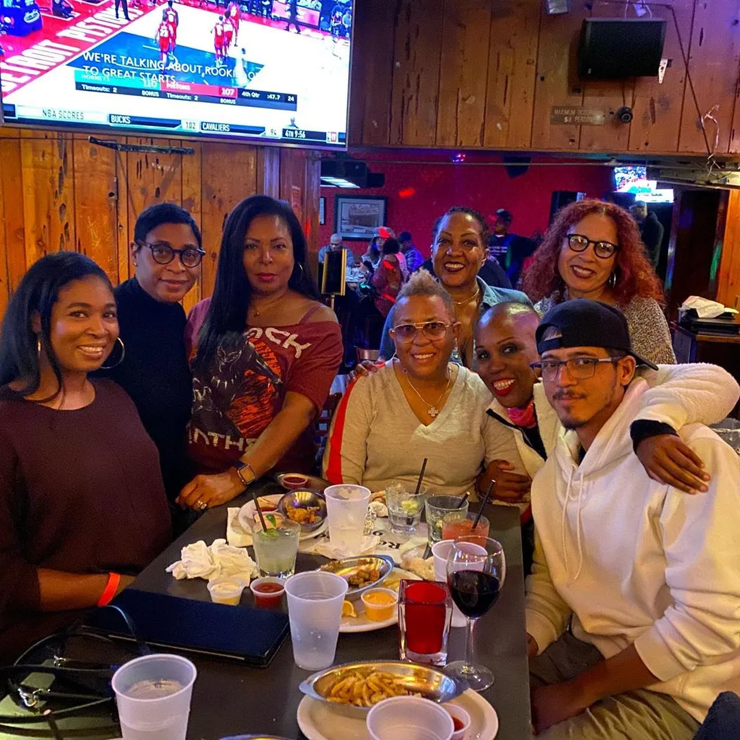 Indoor group dining with drinks at sports bar near LAX