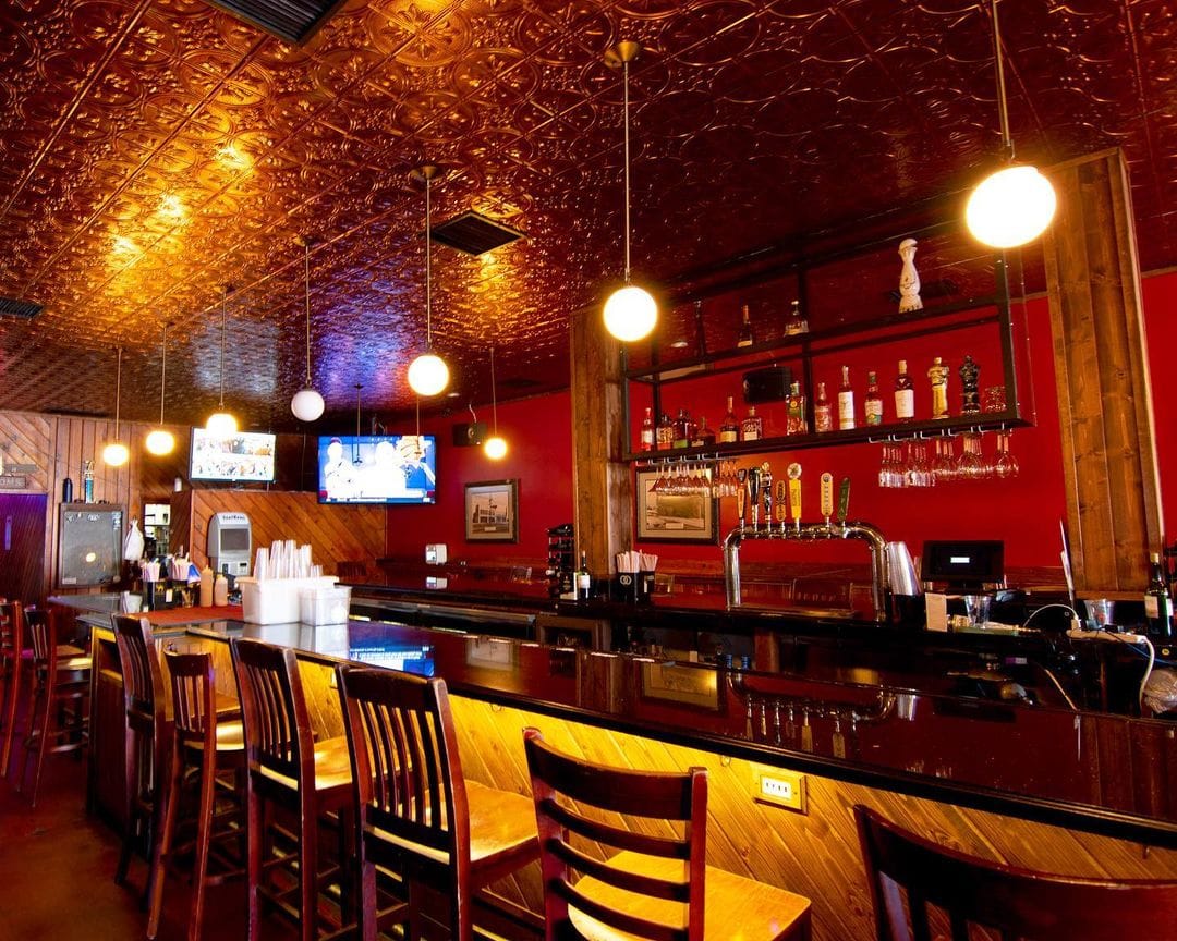 Crowd watching sports at Melody Bar and Grill