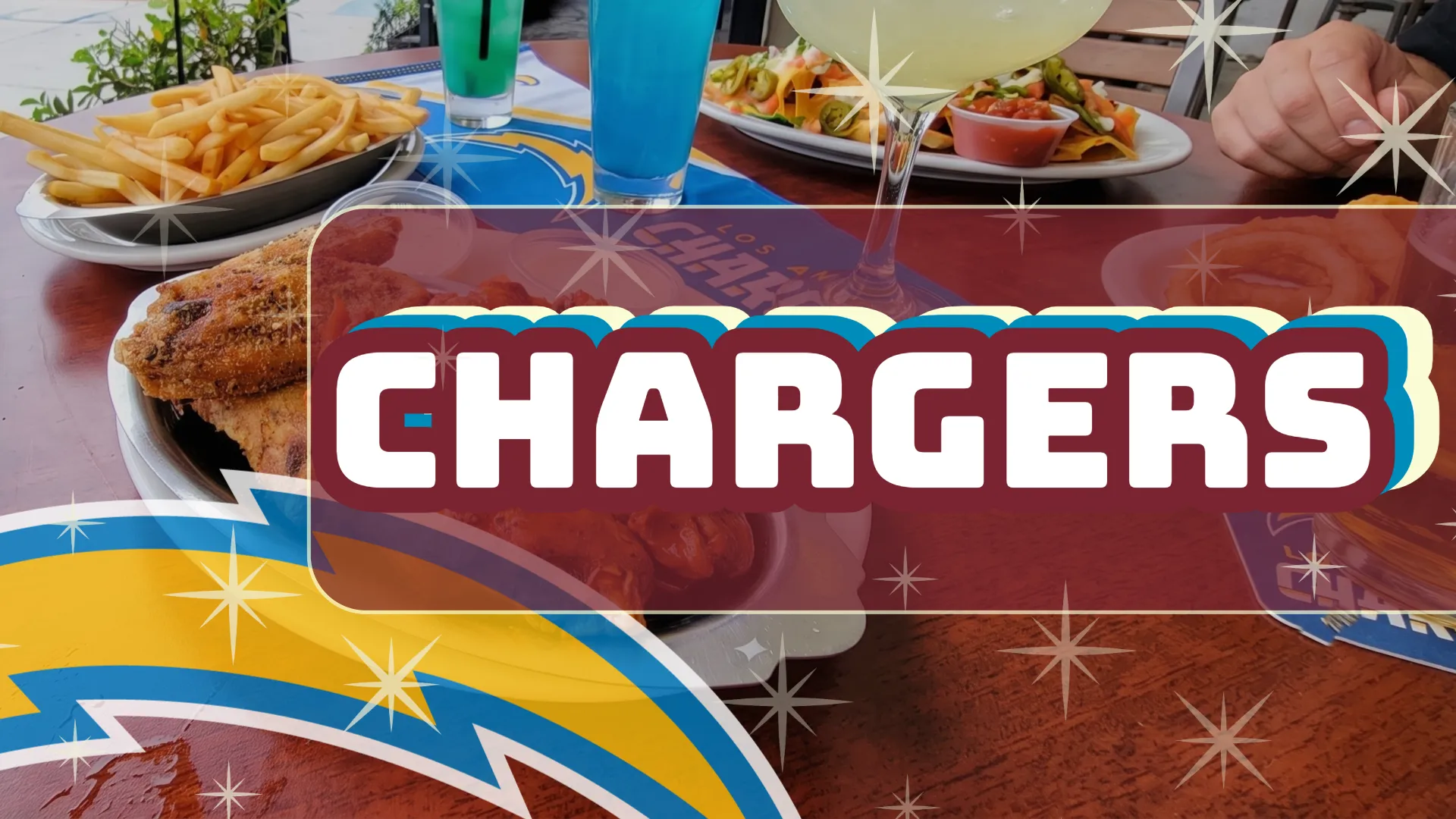 Graphic text reading 'CHARGERS' in bold white letters over a background image of a table filled with bar food and blue drinks, featuring the Los Angeles Chargers lightning bolt logo in the bottom left corner.