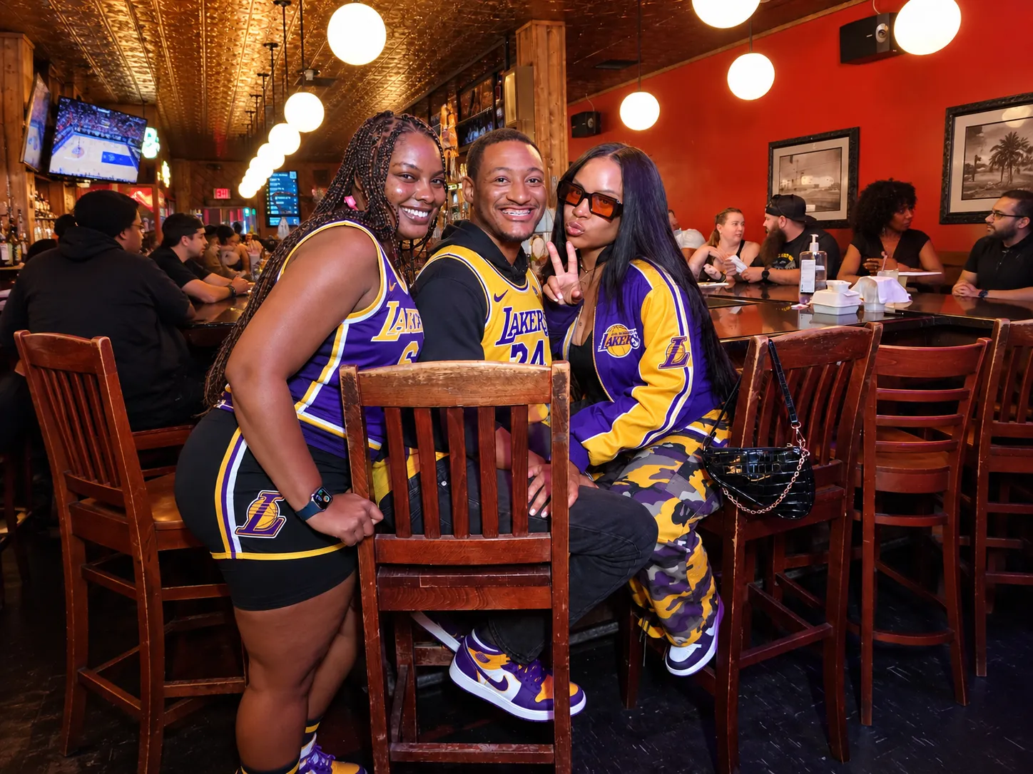 Lakers fans watching the game together at Melody Bar and Grill near Inglewood